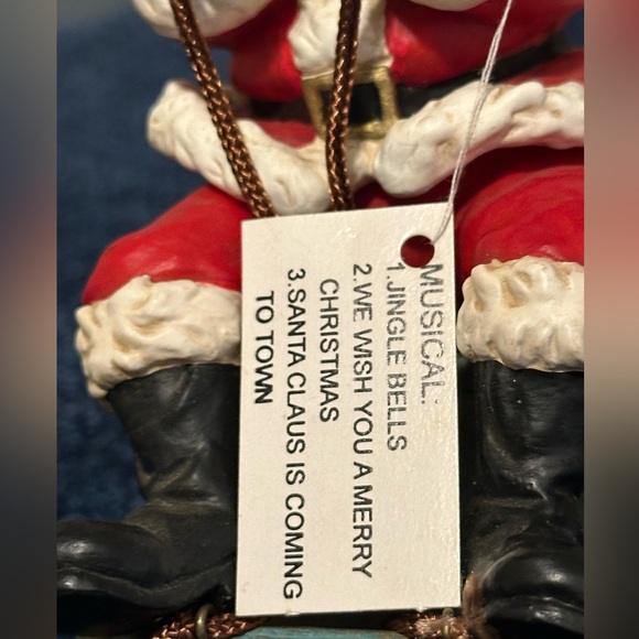 Musical vibrating Santa on his sleigh. Plays 3 songs! - Picture 9 of 13